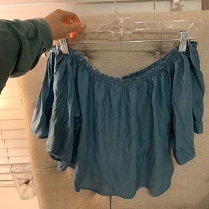 Off the shoulder silk blue shirt